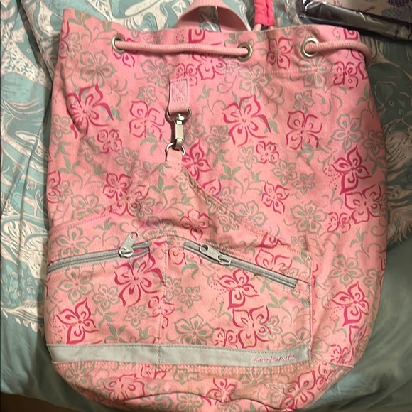 Dakine Pink and Gray Backpack with flower pattern. Drawstring. Wet pouch. - Picture 1 of 4